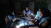 Afghan election workers count ballots in the presidential elections at a polling station in Kabul, Afghanistan, Sept. 28, 2019. An unofficial estimate put voter turnout at a little more than 2 million voters out of nearly 10 million.
