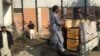 Bodies are removed from scene of militant attack at Bacha Khan University in Charsadda, Pakistan, Jan. 20, 2016. (Photo: N. Takar / VOA Deewa) 