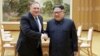 North Korean leader Kim Jong Un shakes hands with U.S. Secretary of State Mike Pompeo, May 9, 2018, released by North Korea's Korean Central News Agency (KCNA) in Pyongyang.