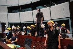 Protesters gather inside the meeting hall of the Legislative Council in Hong Kong, July 1, 2019.