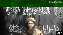 (FILES) This handout file photo provided on May 10, 2007 by IntelCenter shows a video frame broadcast by the Arabic news channel Al-Jazeera on May 8, 2007 and released by al-Qaeda of the purported chief of the Al-Qaeda branch in North Africa,…