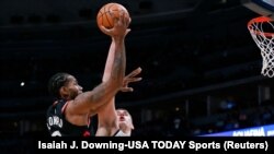Kawhi Leonard, à gauche, Denver, Colorado, le 16 décembre 2018. (Isaiah J. Downing-USA TODAY Sports)