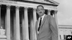 FILE - This Aug. 22, 1958 file photo shows Thurgood Marshall outside the Supreme Court in Washington.